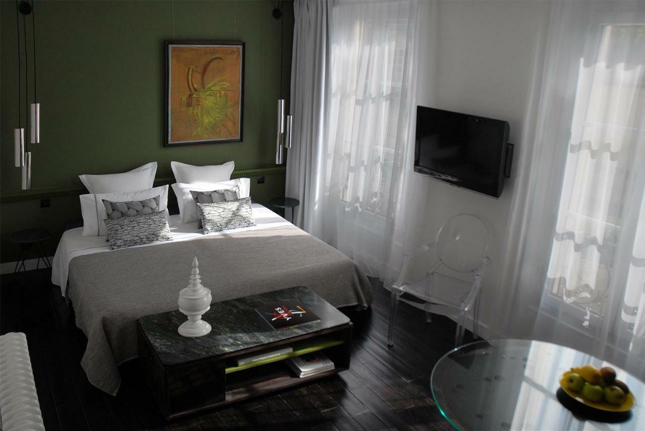 The Sleeping Lion Apartment Paris Bagian luar foto