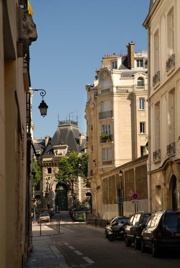 The Sleeping Lion Apartment Paris Bagian luar foto